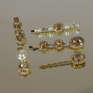 Pack of 5 gold and pearl clips with bronze and clear rhinestones
